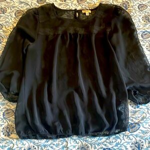 Sheer black lace bubble top with lace detail